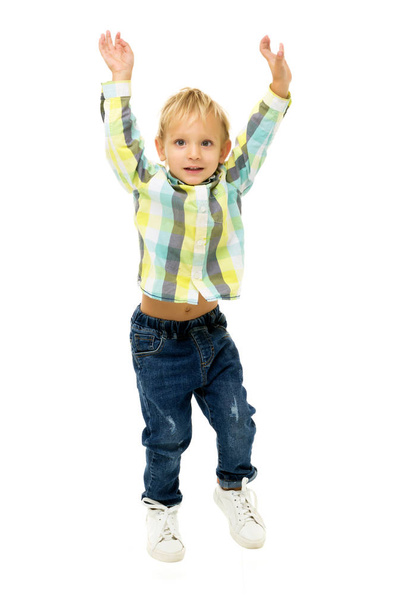 Little boy jumping.The concept of a happy childhood, sports and - Фото, зображення