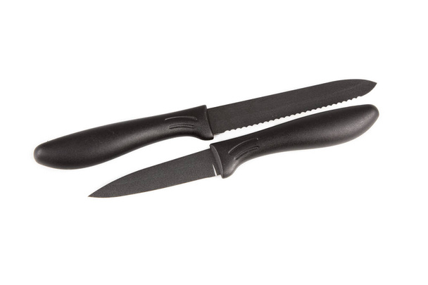 sada dvou černých nožů opravdu vystřihnout izolované bílé pozadí - Fotografie, Obrázek
