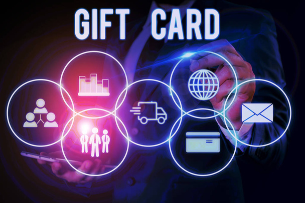 Word writing text Gift Card. Business concept for A present usually made of paper that contains your message Male human wear formal work suit presenting presentation using smart device. - Photo, Image