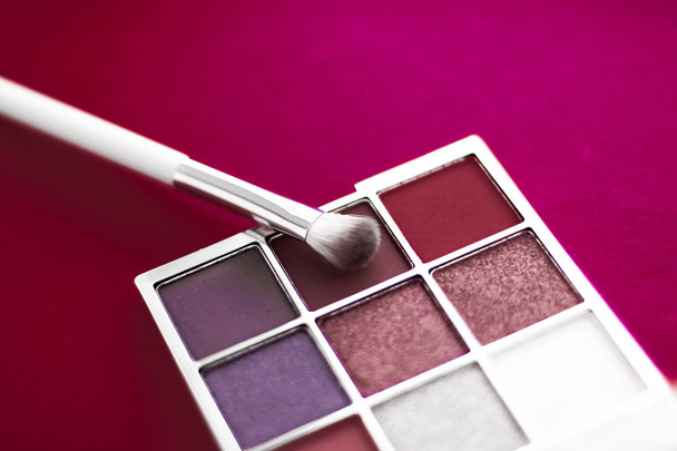 Eyeshadow palette and make-up brush on cherry background, eye sh - Photo, Image