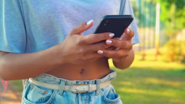 details teen walks chatting online digital lifestyle - Footage, Video