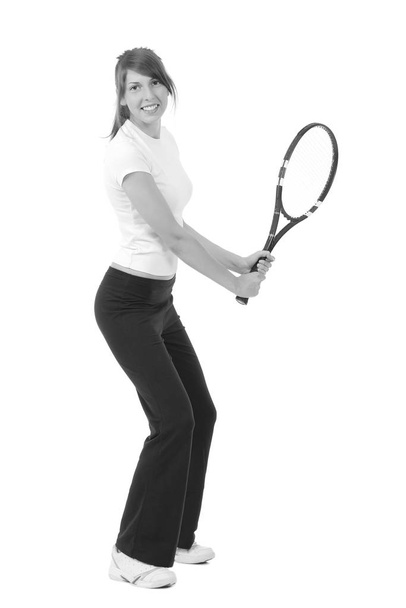 Chica joven con una raqueta de tenis - Foto, imagen