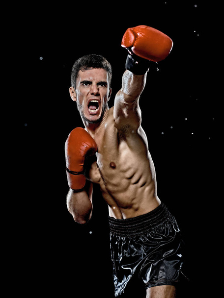caucasian young boxer boxing man portrait waist up isolated black background - Foto, imagen