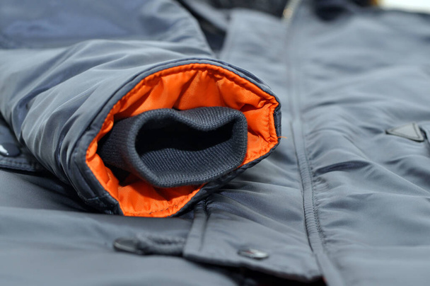 Sleeve cuff of a men's winter jacket. - Foto, Bild