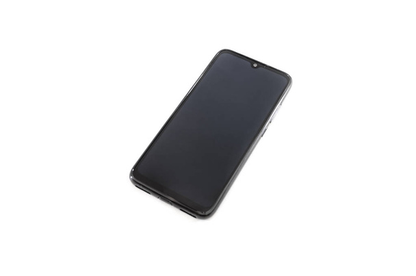 siyah beyaz bir arka plan üzerinde izole smartphone. - Fotoğraf, Görsel