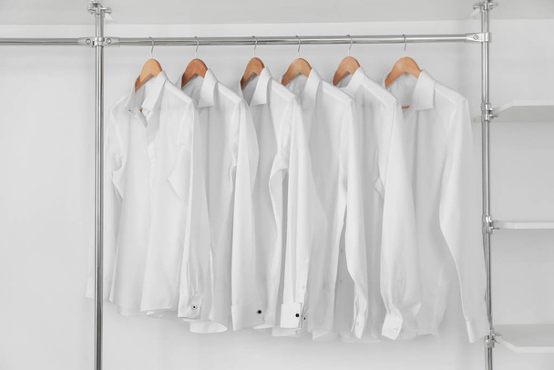 Rack with clothes in modern dry-cleaner's - Photo, Image