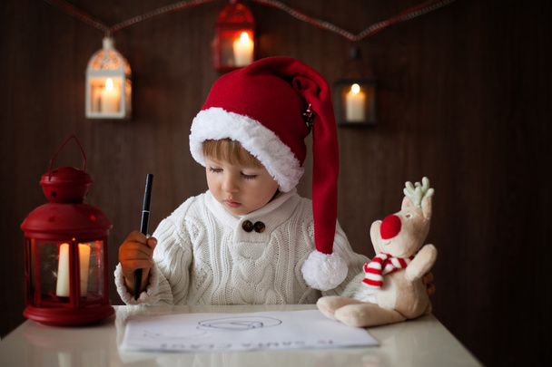 Little boy on christmas, writing letter to Santa - Fotó, kép