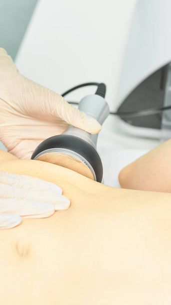 Cavitation rf body treatment. Female ultra sound lipo machine. Spa contouring. Doctor hands - Fotoğraf, Görsel
