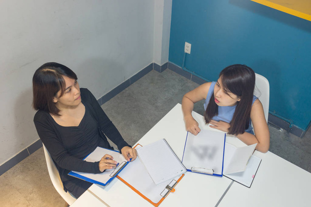 Top view of office women discuss about work - Photo, image