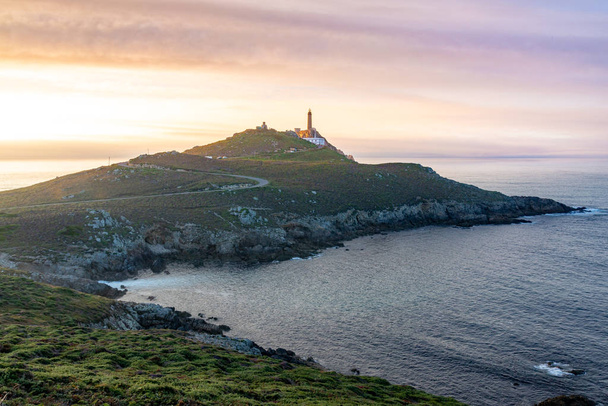 Cape Vilan Lighthouse, Cabo Vilano, in Galicia at sunset, Spain - Photo, Image