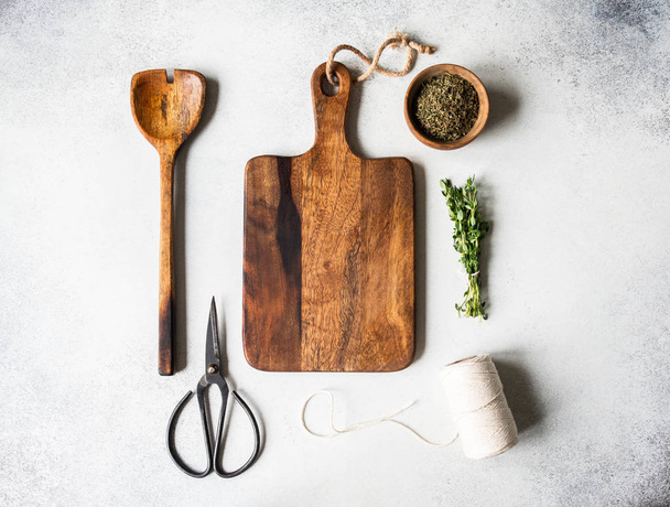 Fresh raw Herbs and wood kitchen were frame on grey background. top view, - Foto, imagen