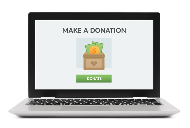 Concepto de donación en la pantalla del ordenador portátil
 - Foto, Imagen