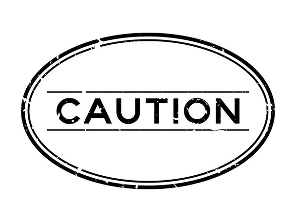 Grunge preto cautela palavra oval selo de borracha no fundo branco
 - Vetor, Imagem