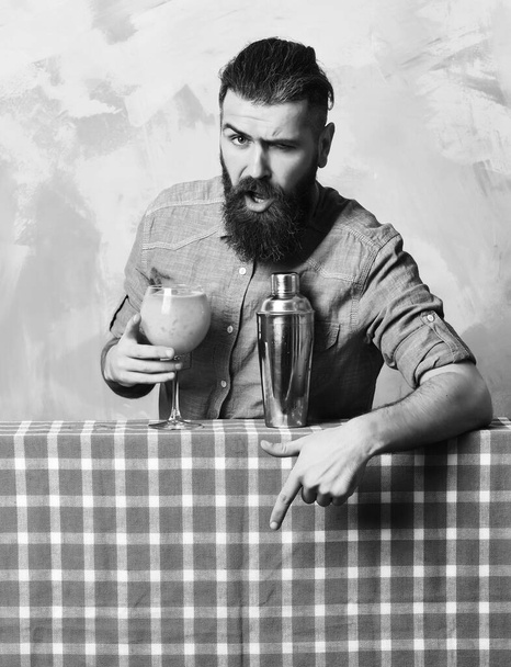 Brutal caucasian hipster doing tropical alcohol fresh cocktai - Fotó, kép