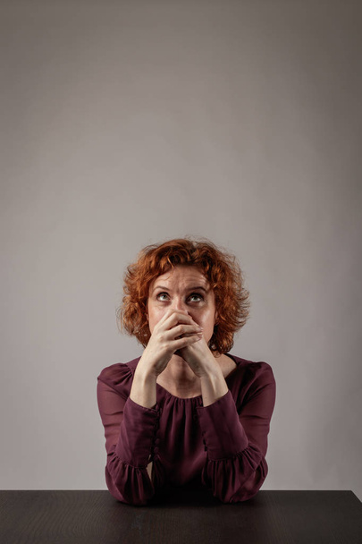 Sad red-haired woman. Depression.  - Foto, Imagem