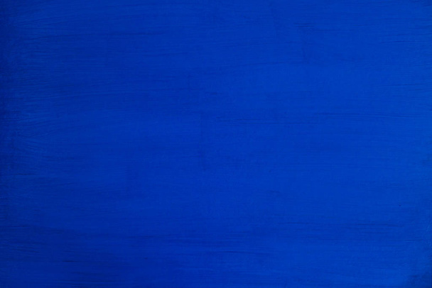 The wall is painted with a blue paint paint structure like a background - Photo, Image