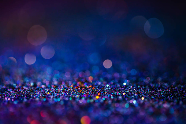 Shiny multicolor glitter raster background. Abstract shimmering pink, blue, yellow circles decorative backdrop. Bokeh lights effect illustration. Overlapping glowing and twinkling spots. - Photo, image