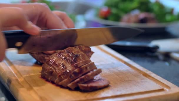 chef cut beef on wooden Board - Video