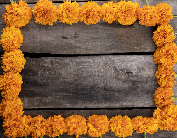 Cempazuchitl flowers on rustic wooden table. - Foto, imagen