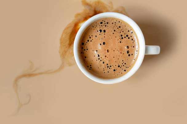 coffee white cup milk background streak foam smoke black one cappuccino inside copy space - Photo, Image