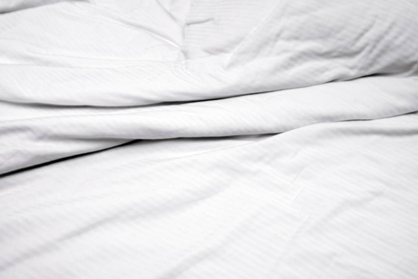 White delicate soft background of fabric or bedding sheet - Foto, afbeelding