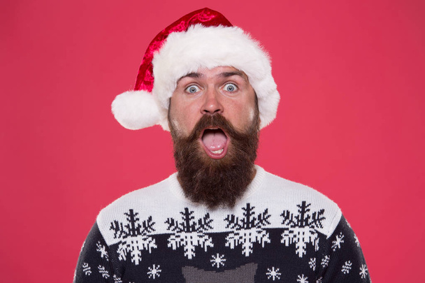 Surprised Santa. Barber services. Happy barber in fashionable santa style. Holiday celebration. Christmas and new year. Facial hair concept. Barbershop. Barber hipster. Bearded man with mustache - Photo, Image