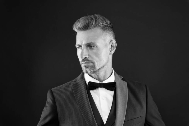 Refinement in every detail. Fashion shop. Rent suit service. Elegant fashion outfit for event. Gentleman modern style. Guy well groomed handsome macho wear tuxedo. Fashion clothes. Tailored suit - Фото, зображення