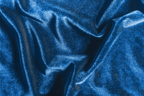 Blue velvet folds texture background, trendy 2020 color - Foto, Imagem