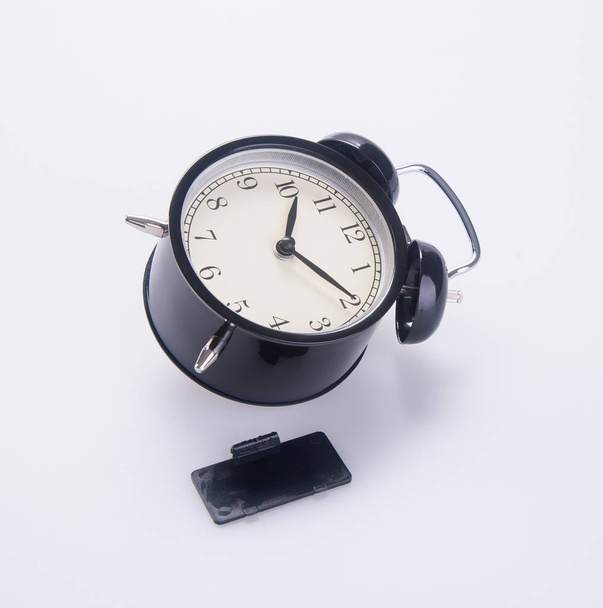 clock or alarm clock with concept on a background new. - 写真・画像