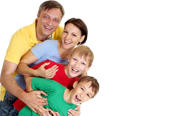 Adorable family in bright T-shirts - Zdjęcie, obraz