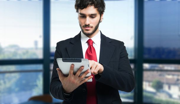 Man using a digital tablet - Photo, image