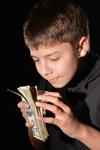 cute smiling boy with money - Foto, Bild