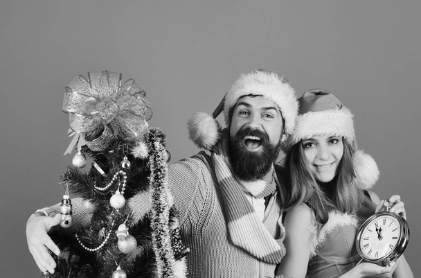 New Year and Christmas time concept. Man and sexy woman - Foto, imagen