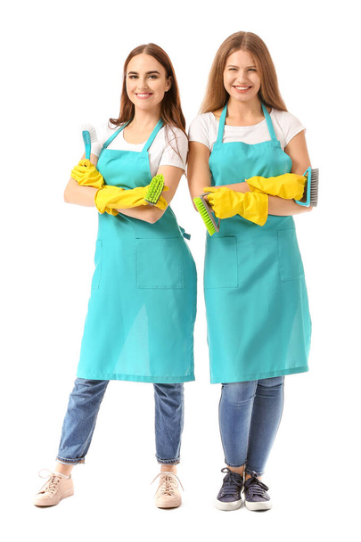 Жіночі прибиральники на білому тлі
 - Фото, зображення