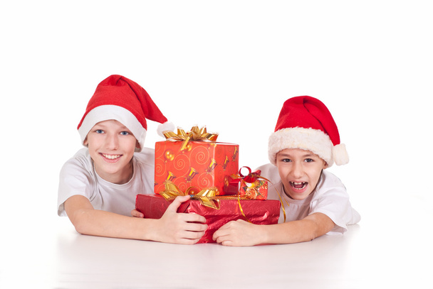 Niños con regalos de Navidad
 - Foto, imagen