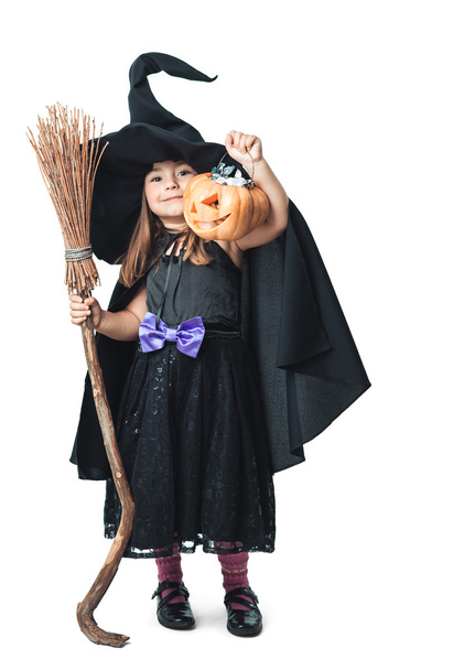 little witch shows the collected candy - Фото, зображення