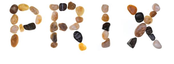 Palabra PRIX hecha a mano con piedras (rocas). Colección de palabras con piedras. Aislado sobre fondo blanco
. - Foto, imagen