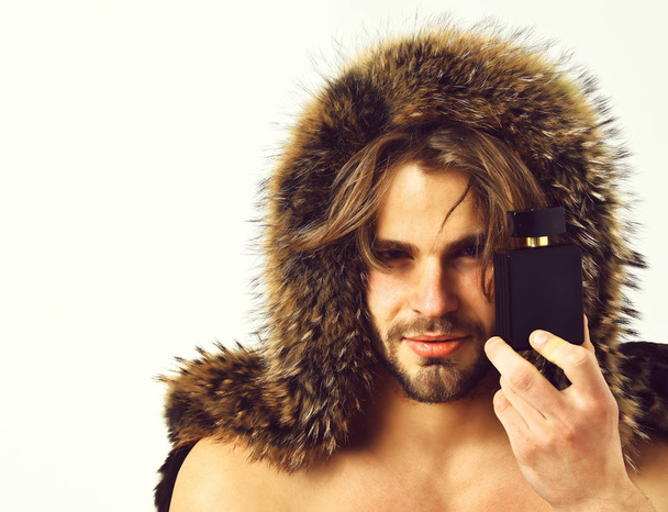 Bearded macho man in fur coat isolated on white background - Fotoğraf, Görsel