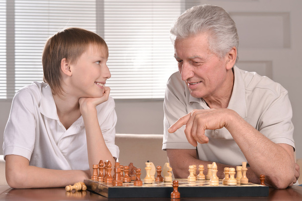 family at a chess - Foto, Imagen