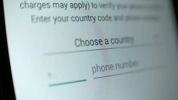 Someone dials touchscreen a phone number for verification in the application. - Footage, Video