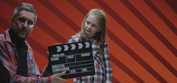 Child actress acting last scene during film shooting - Photo, Image