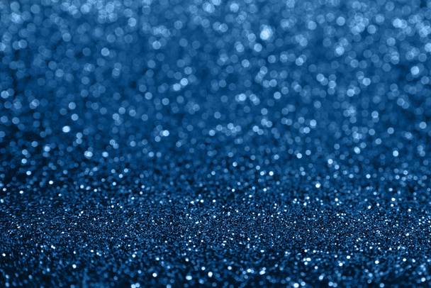 Abstract composition. Blue glitter light background with beautiful bokeh. Color of the year 2020 - Valokuva, kuva