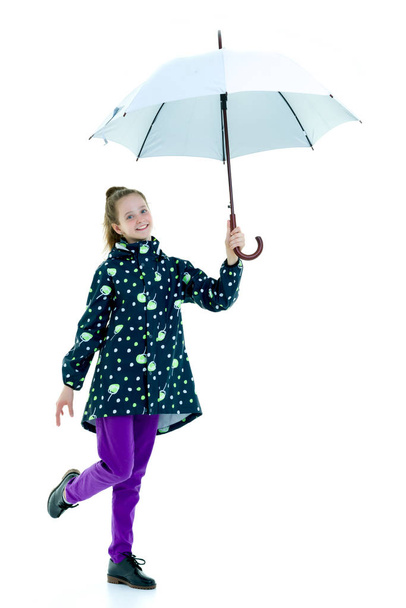 Cute little girl with umbrella. Weather forecast concept. - Fotoğraf, Görsel