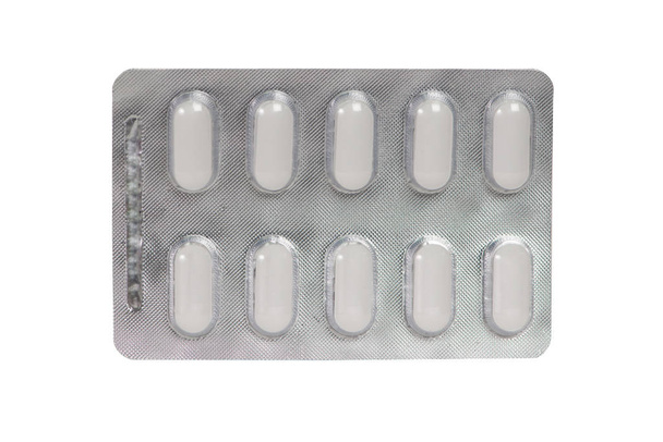 Läpinäkyvä läpipainopakkaus, jossa lääketieteellinen tabletti valkoisella
 - Valokuva, kuva
