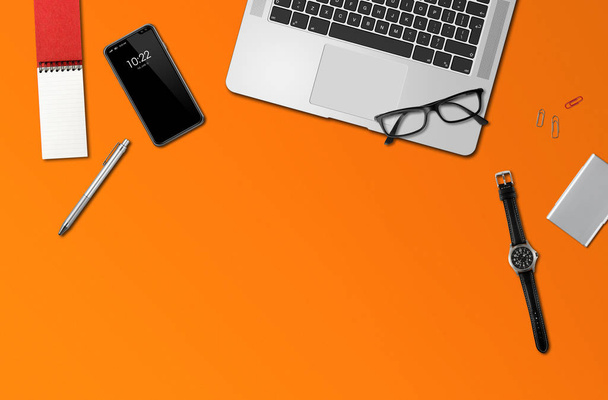 Office desk mockup top view isolated on orange - Foto, afbeelding