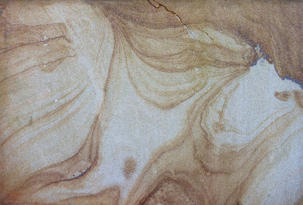 sandstone surface texture with waved pattern as background - Fotó, kép
