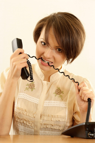 angry woman with a phone - Foto, Imagen