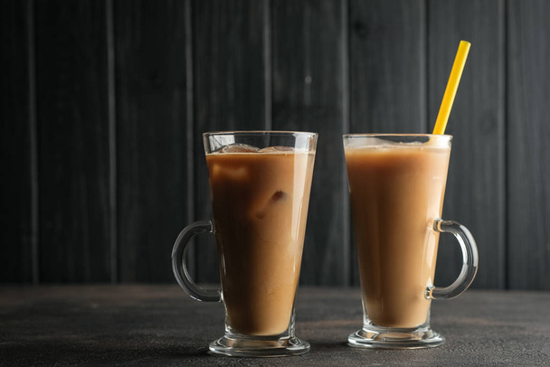 Ice coffee in glasses  on a dark background copy space. - Foto, Imagen