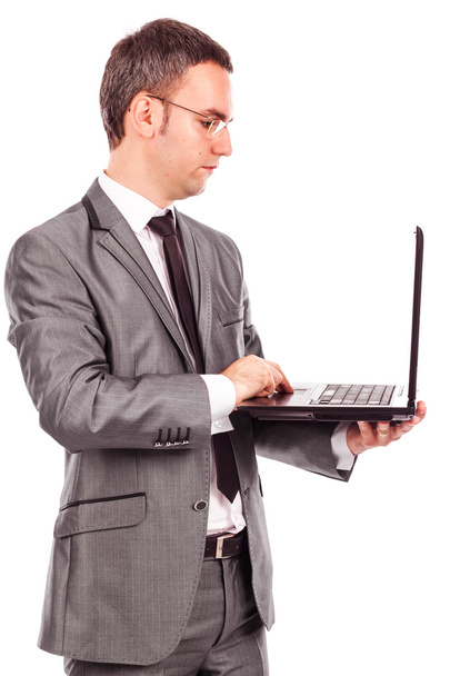 Young businessman using laptop - Foto, Imagem
