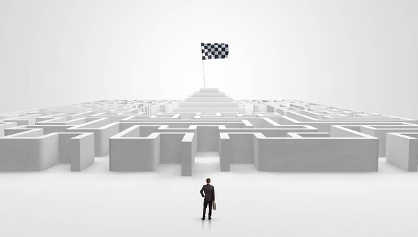 Man standing outside of a maze with pirate flag - Photo, Image